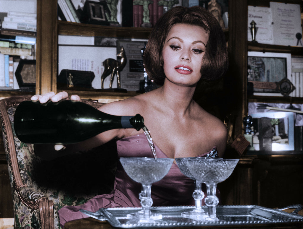 Sophia Loren pouring Champagne 1963